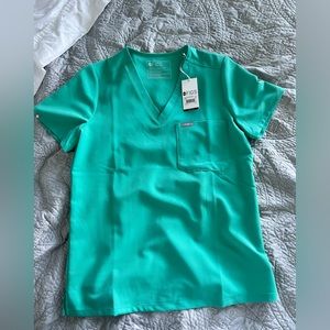Brand new Figs scrub top with tags! Size small